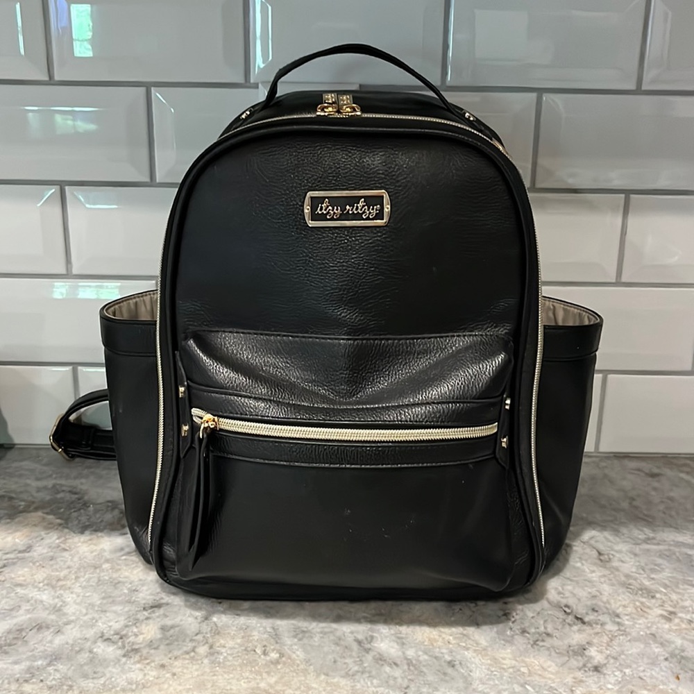 Itzy Ritzy mini boss bag